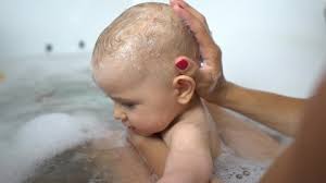 Bathing three times a week will be just fine until your baby is a year old. Child Taking Bubble Bath Stock Video Footage 4k And Hd Video Clips Shutterstock