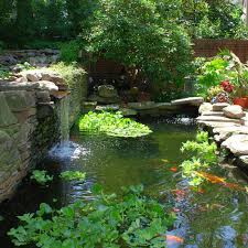 While holding the flange in place on the barrel, drill the holes for the 4 bolts. Adding A Water Feature To Your Koi Pond Next Day Koi