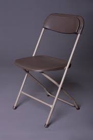 Basic folding chair with metal legs and plastic seat and back. Dining Chairs Pico Party Rentals