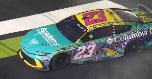 Bubba Wallace spins after contact with Ty Gibbs during Quaker State 400 Stage 2