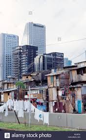The case of sao paulo, brazil shift in migration toward cities with lower costs. Einer Favela Slum Vor Corporate Towers In Sao Paulo An Der Wende Zum Neuen Jahrtausend Brasilien Stockfotografie Alamy