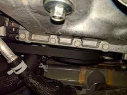 If the insert is loosened, it may be necessary to remove the oil pan and tighten the nut to prevent a possible oil leak. Oil Change How To New And Improved With Pictures 2017 Chrysler Pacifica Minivan Forums