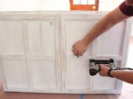 Turn A Kitchen Cabinet Into A Flat Screen Tv Cover Diy Kitchen Cabinets Wall Mounted Tv Diy Cabinets