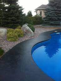 Stamped Concrete Border Around An Inground Pool Concrete Colors Patios Concrete Pool Pool