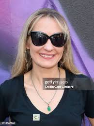 Artists Gear Duran and his wife Heather Hermann pose in front of a... News  Photo