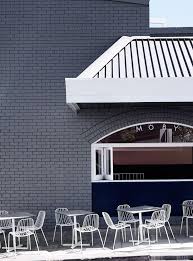 A Melbourne Restaurant With An Au Courant Color Palette Remodelista Cafe Interior Painted Brick Exteriors Interior Design Awards