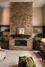 Floor To Ceiling Stone Surround Gas Fireplace With Custom Shelving Parade Of Home 11 Homestead Fireplace Shelves Fireplace Rustic Living Room