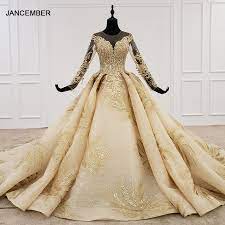 Huge selection of 2019 cheap golden brautkleider onsale with 10$ cash coupon. Htl1124 Goldene Spitze Brautkleider Prinzessin Cut Oansatz Pailletten Langarm Hochzeit Kleider Champagne Vestido De Noiva Manga Longa Wedding Dresses Aliexpress
