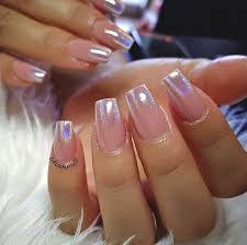 The overlay of rose gold glitter on this otherwise clean ombre french nail tips is a good way to glam up the look. Rose Gold Matte Ombre Nails Short Matte