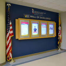 We Recently Created This Wall Of Excellence For University Of Maryland Medical Center Midtown It Features Four Screens T Room Signage Health Care Wall Display