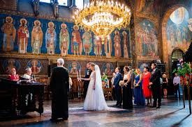In the middle of exchanging vows. St Nedelya Church Sofia Bulgaria Wedding Ceremony Image Of A Popular Bulgarian Tradition Of The Bride And Groom In Front Of A Priest In A Church Wedding Photojournalist Association