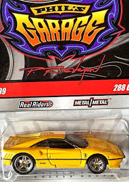 The name on the base is: Hot Wheels Chase Ferrari 288 Gto Garage Real Riders 1 64 Por Initials Yellow Ferrari 288 Gto Hot Wheels Ferrari