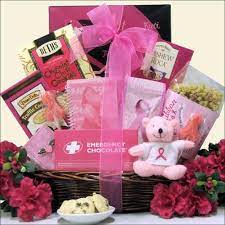 Magazines, journals, organic lip balms or aloe to soothe chapped skin, a squishy stress ball, cozy socks, aromatic candles, plus crackers, ginger candy, tea, and/or a favorite snack, are just a few ideas. Hope Breast Cancer Gift Basket