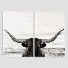 Black And White Bull Canvas This Bold Diptych Captures The Head On Stare Of A Longhorn Bull In Versatile Black And White It S A Modern Add Vintage Wall Art Wall Art Prints Wall Art Sets
