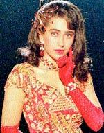 Karishma kapoor made her debut in the 1991 movie prem qaidi. Charisma Takes Over Society The Arts News Issue Date Dec 31 1996