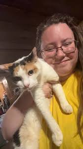 Kitty Reunited with Family After Being Lost