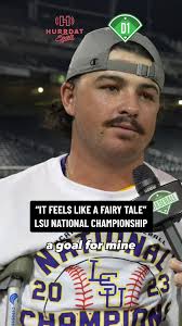 Alex Milazzo of LSU baseball broke his leg while diving into home during  the College World Series final. He stayed in the dugout to cheer