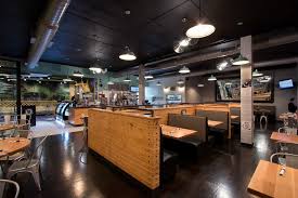 Industrial Lighting Lends Chic Atmosphere To Restaurant Inspiration Barn Light Electric