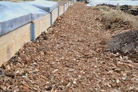 Because tiny weed seeds have a hard time pushing up and through the wood chips, they simply cannot grow (not all, but most), therefore reducing the amount of weeds in the garden. My Wood Chip Garden Paths Sara S Kitchen Garden