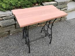 My mother had purchased a singer sewing machine (circa 19020's) from an antique store but hadn't used it in a long time, so she offered this as an her idea was to use the base and remove the original sewing machine top, as this was hardly an eating surface to build this old sewing machine table. How To Repurpose An Antique Sewing Machine Base Into A Unique Table Feltmagnet