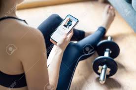 Free crossfit training plans (routines). Home Gym Workout With Online Exercise App In Phone Fit Woman Stock Photo Picture And Royalty Free Image Image 147625553