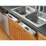 Sink front tip out tray