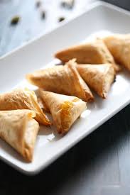 Phyllo dough is one the most versatile pastries around, and phyllo dough dessert recipes are able to live up to that versatility as well. Pistachio Cream Cheese Fillo Triangles Lemons For Lulu Pistachio Recipes Pistachio Cream Cream Cheese Snacks