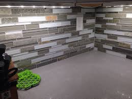 Costco Glass Stone And Tile Backsplash Purchased In Store With A Rebate With Delorean Grey Grout Grey S White Shaker Cabinets House Design Shaker Cabinets
