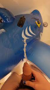 Quick golden shower for a cum stained inflatable shark - ThisVid.com