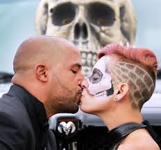 Local couple says "I boo" during Halloween-themed wedding