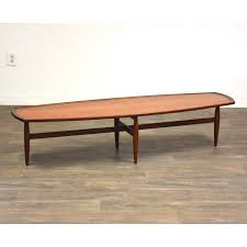 This table measures 56 long by 19 wide by 15 tall and has bowtie joining on the top. Drexel Declaration Walnut Coffee Table Mixed Modern Furniture Mid Century Furniture Dealer