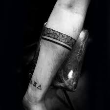 Top 43 Black Band Tattoo Ideas 2021 Inspiration Guide Band Tattoos For Men Black Band Tattoo Band Tattoo Designs