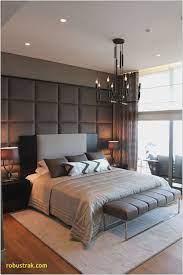 The hardwood flooring is topped by a stylish area rug. Medium Size Bedroom Design Small Modern Bedroom Luxury Bedroom Master Modern Master Bedroom