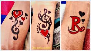 This mom's wrist tattoo incorporates her kids' names into a pretty infinity symbol. Three Best Tattoo For Boys And Girls Simple Tattoo Of R Letter Youtube