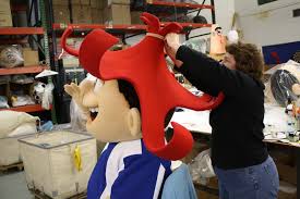 Working On The Beautifully Tailored Hat For Punchy From Hawaiian Punch Www Olympus Mascots Com Hawaiian Punch Mascot Costumes Dinosaur Stuffed Animal