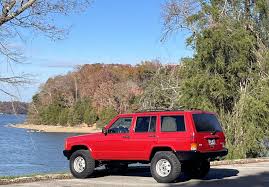 Image result for Flame Red 2006 Jeep