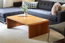 The soft lines and smooth curves add a cozy feel to the room. Teak Waterfall Coffee Table By Nae Denmark Mid And Mod