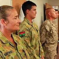 U.S. Army Lt. Col. Thomas Feltey, left, the commander