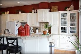 This kitchen has a vintage look that might be just right for your home. W 5 Jpg 610 407 Pixels Red And White Kitchen Red Kitchen Cabinets Barn Red Kitchen