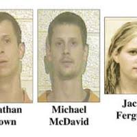 Four charged in murder