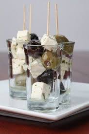 Greek Appetizers With Black And Green Olives And Feta Cheese Greek Appetizers Wine And Cheese Party Appetizer Recipes