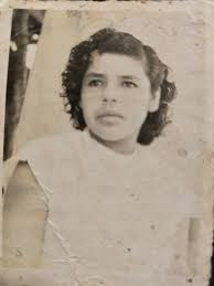 This is a pic of my beautiful grandmother in the 50s, who I wish was still  alive , she died young and unexpectedly, can someone help me add color and  a little