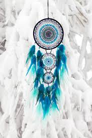 I have also listened to the audio version of dreamcatcher, so all that remained for me was to see this movie. Dream Catcher With Feathers Threads And Beads Rope Hanging Dreamcatcher Stock Photo Picture And Royalty Free Image Image 140435341