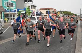 Special Olympics Torch Run ceremony held at Rehoboth Bandstand
