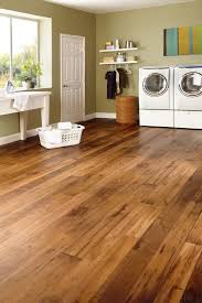 Luxury vinyl flooring inspired by nature without the practical drawbacks of real wood. Stratamax Better Armstrong Vinyl Wood Look Flooring Woodcrest Dark Natural My Brother Has This Would Be Per House Flooring Vinyl Wood Flooring Woodcrest