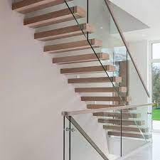 Floating modern stairs rising above dining room in modern open concept house. Modern Design Loft Stair Floating Stair Glass Staircase Build Floating Staircase 2nd Floor Loft Stair Buy Acacia Wood Stair Treads Diy Floating Stairs Interior Wood Stairs Product On Alibaba Com