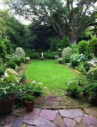 Pin By Karen Mccreary On Into The Garden Statues And Urns Small Cottage Garden Ideas Charleston Gardens Small Backyard Landscaping
