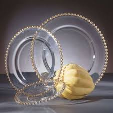 These plastic charger plates are elegant, simple, and sophisticated. Squarespace Claim This Domain Gold Beaded Glass Charger Plates Gold Dinnerware Charger Plates