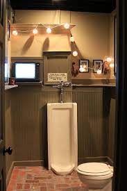 One of the greatest human inventions of all time is the cave. Pin By Xander Phillips On Basement Man Cave Designs Man Bathroom Man Cave Bathroom Man Cave Basement