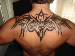 Inspired designs incorporate artistic elements such as bold, large, pointed, and dark shapes and lines as well as an animal or natural imagery. Tattoo Tribal Back Tattoos For Guys Tribal Back Tattoos Tribal Tattoos